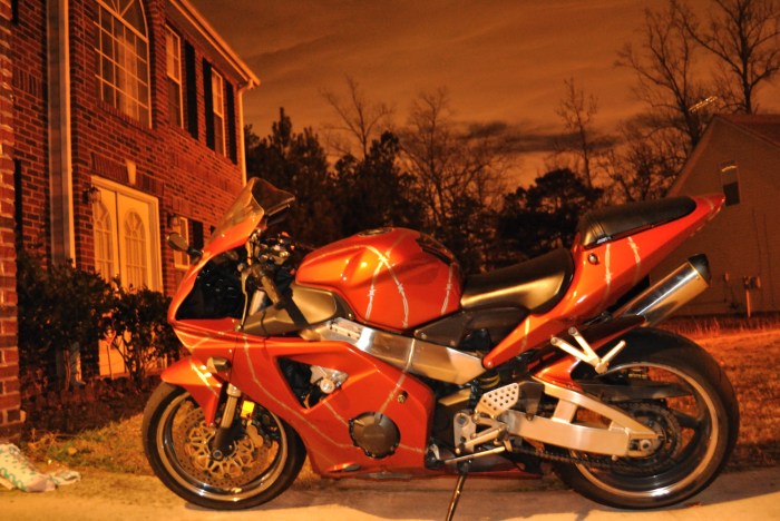 My personal Honda CBR 954 RR...father's day gift to myself a few years back.  Captured this shot with the Nikon one evening after sunset.  No editing, no lie. hint...garage lighting :)